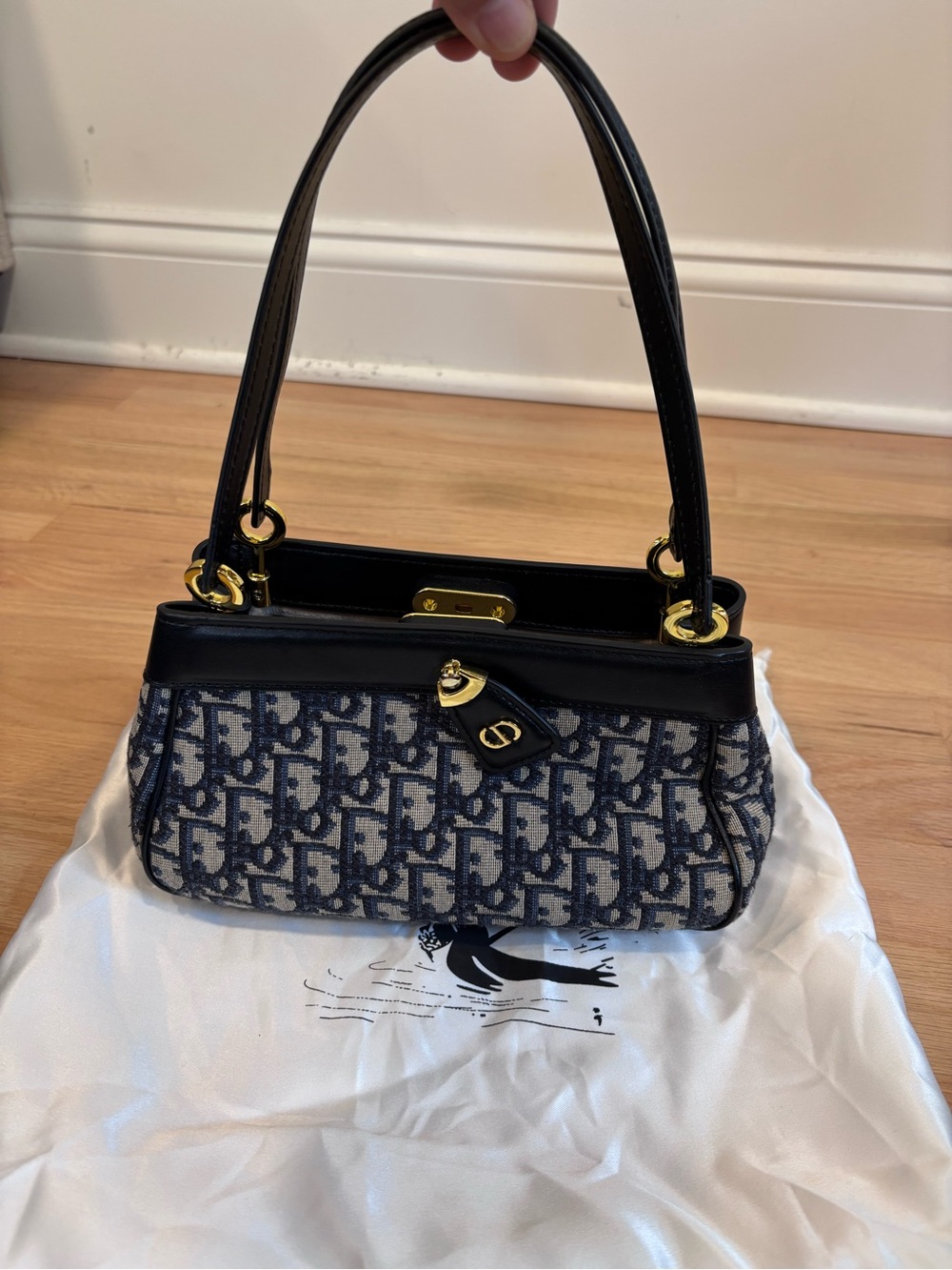 Designer inspired Oblique Key Bag crafted in blue jacquard canvas in dustbag